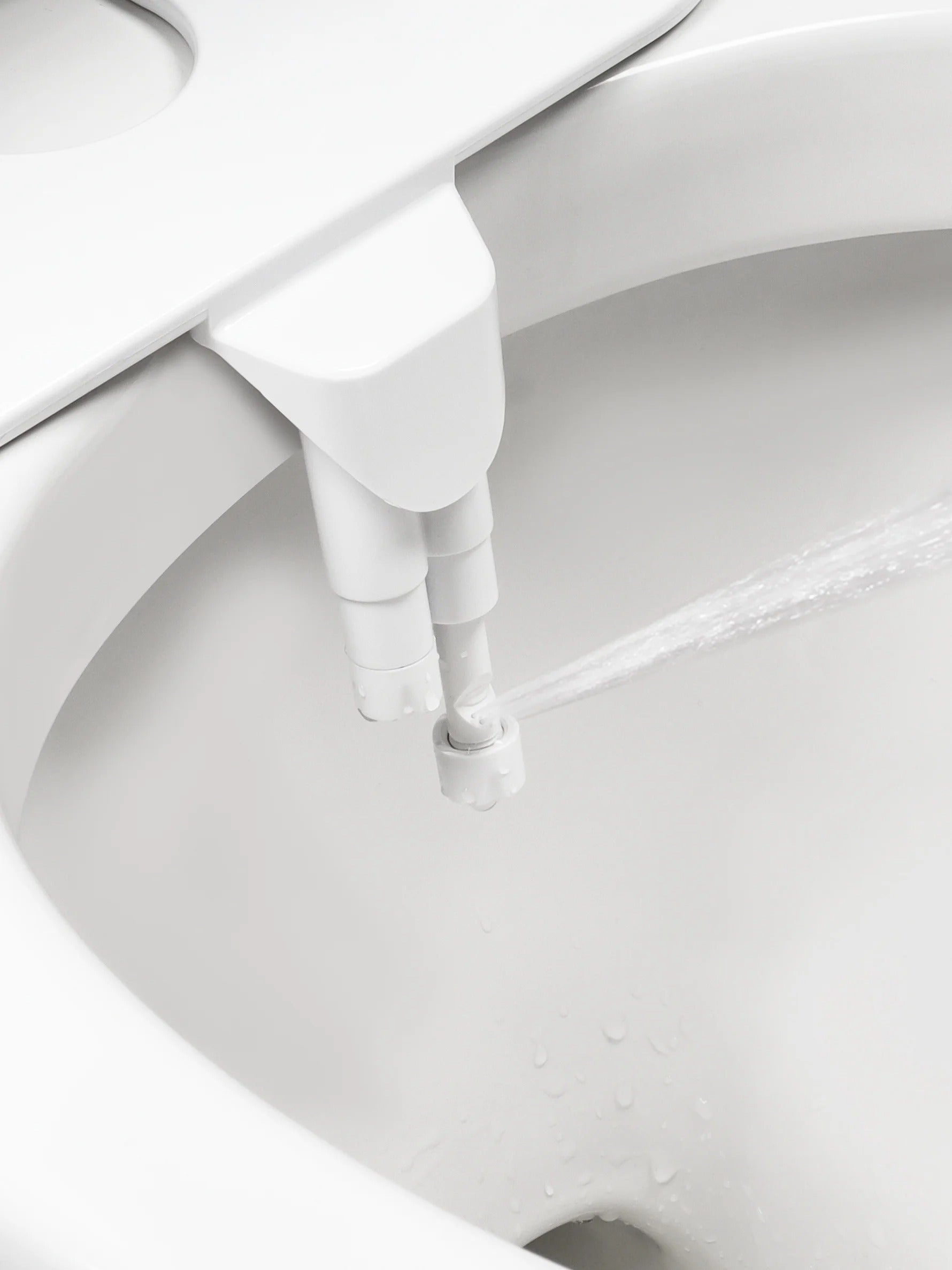 Dual Nozzle Bidet Attachment with Adjustable Pressure and Self Cleaning
