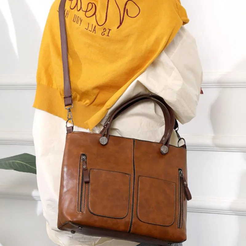 Genuine Leather Bag with Multiple Interior Compartments and Structured Design
