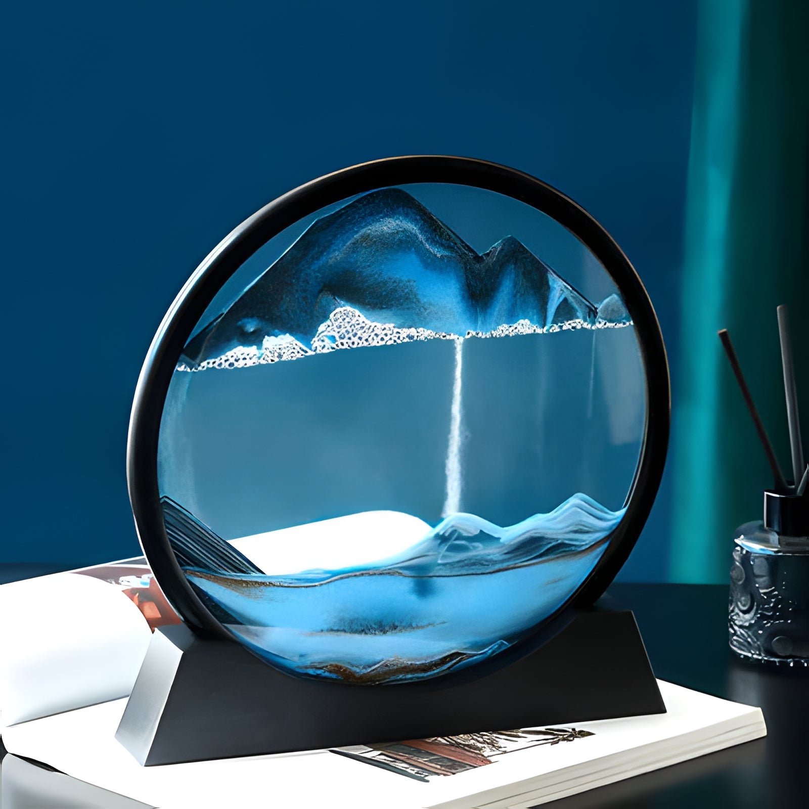 Rotating Sand Art Display with Multicolor Layers and Black Frame