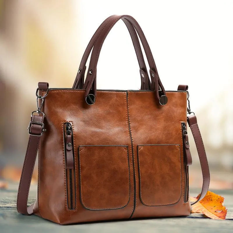 Genuine Leather Bag with Multiple Interior Compartments and Structured Design